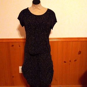 Skirt and blouse, stretchy and hangs nicely when on.